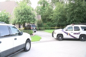 two bodies found in woodlands home-possible murder/suicide