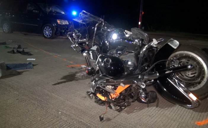 IMPAIRED DRIVER REAR-ENDS MOTORCYCLE STOPPED FOR RED LIGHT-DRIVER CRITICAL