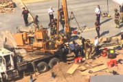 Man dies in collapsed hole at Spring warehouse construction site